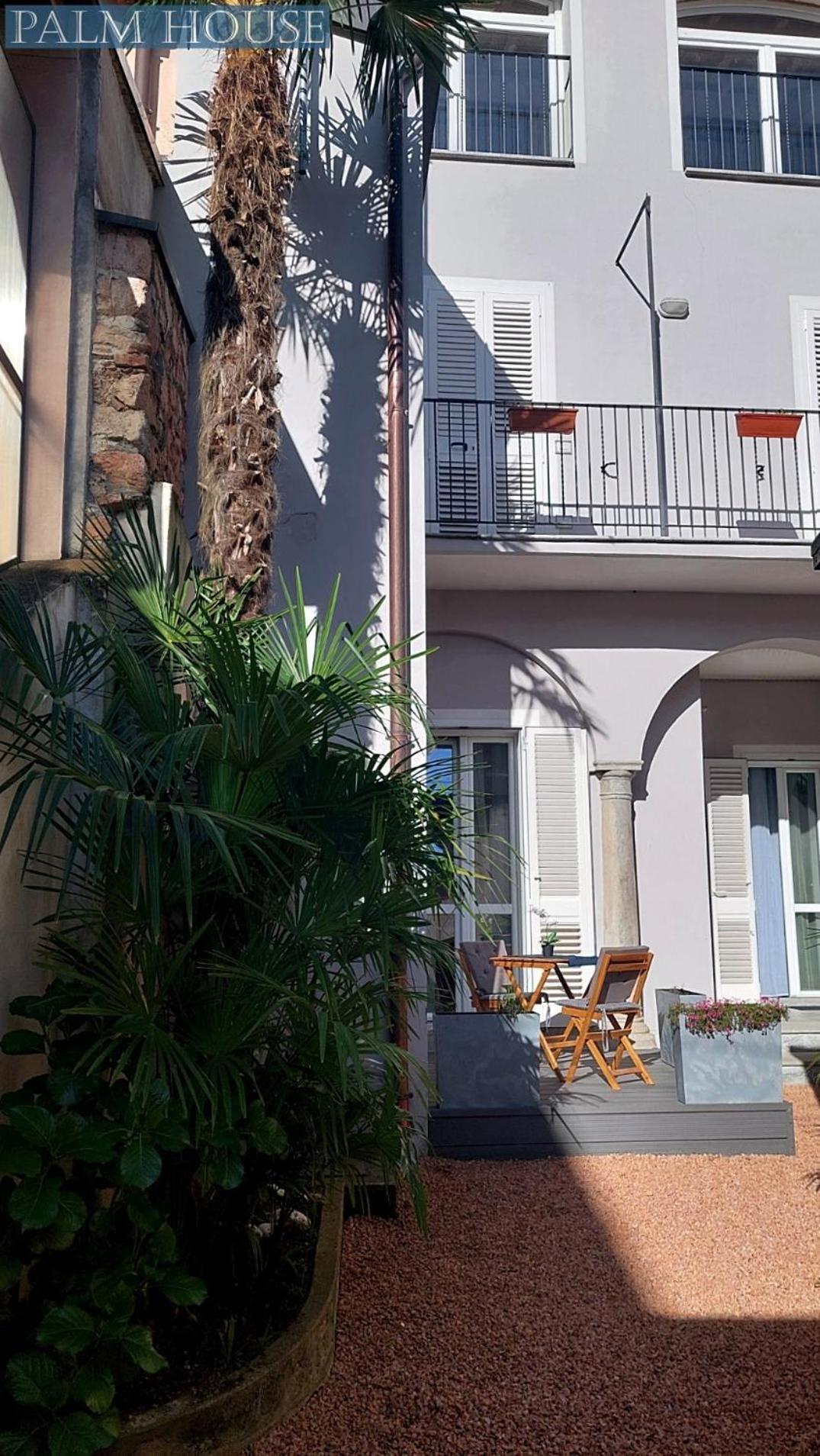 Palm House Appartement Brusimpiano Buitenkant foto